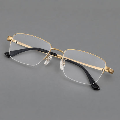 Half frame titanium glasses with rectangular lenses and rounded hinge details in Gold, three quarter view lens detail