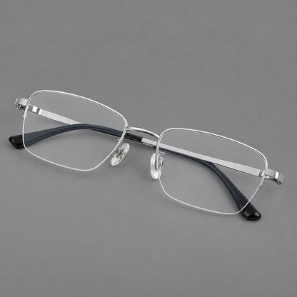 Half frame titanium glasses with rectangular lenses and rounded hinge details in Silver, three quarter view additional product view