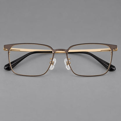 Bold rectangular titanium glasses with strong upper corners and flat metal temples in Gold, front view temple detail