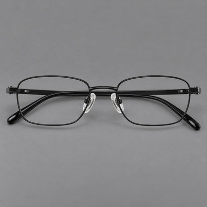 Shallow rectangular titanium glasses with a broad bridge and stepped temple joins in Black, front view side view