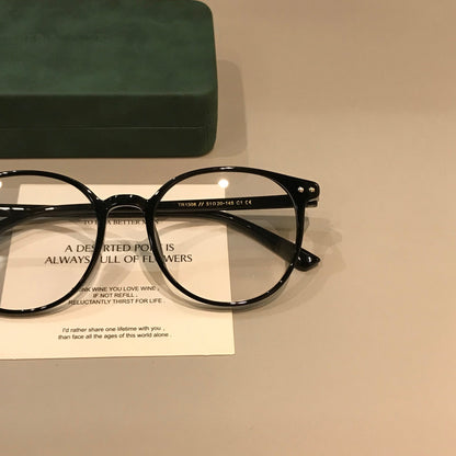 Oval TR Eyeglass Frames | Coffee Brown or Black temple detail