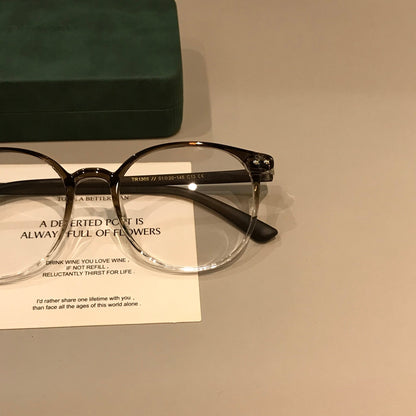 Oval TR Eyeglass Frames | Coffee Brown or Black front view