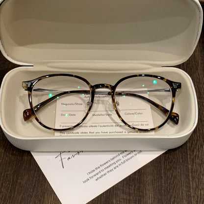 Slender Round Frames | Tortoise, Black or Clear side view