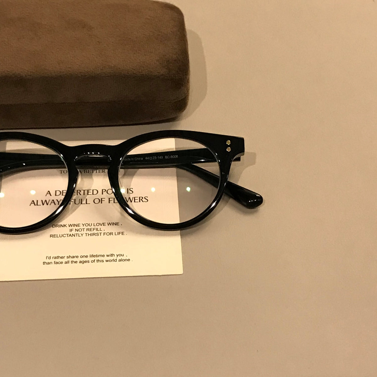 Compact Oval Frames | Black or Tortoiseshell temple detail