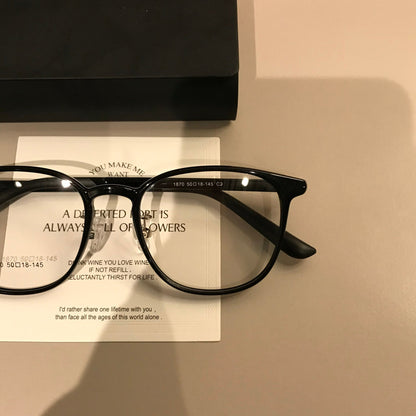 Compact Round Eyeglass Frames | Corner Accents lens detail