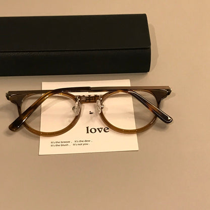 Compact Round Frames | Black or Tortoiseshell temple detail